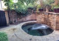 Oval Hot Tub Spa With Waterfall And Feng Shui Garden Decor